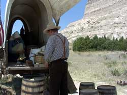 Living History, emigrants reenact stocking the wagon with supplies at Scotts Bluff National Monument, Refer to Acknowledgements #36